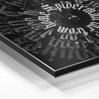 Gros plan de la matière : le tirage contrecollé sur aluminium Dibond mat, tranche visible.