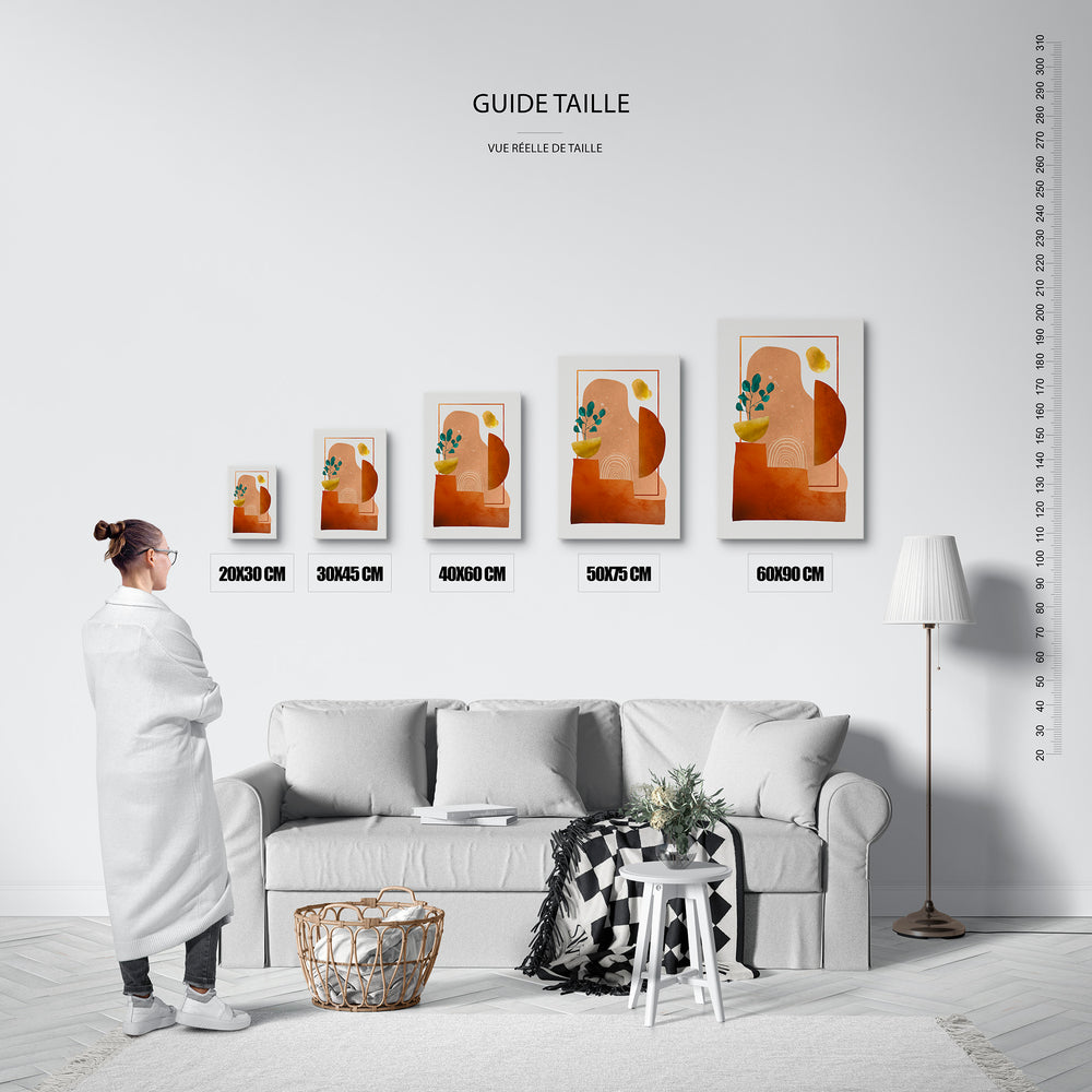 Guide des tailles : le tirage présenté dans ses 5 formats de vente, à l'échelle réelle sur un mur de salon, avec une règle en centimètres.