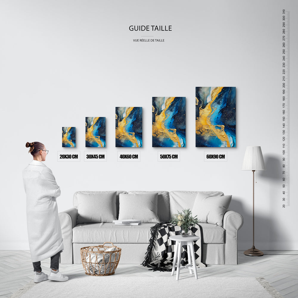 Guide des tailles : le tirage présenté dans ses 5 formats de vente, à l'échelle réelle sur un mur de salon, avec une règle en centimètres.