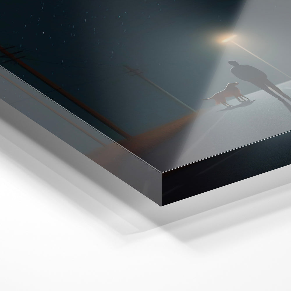 Gros plan de la matière : le tirage sous verre acrylique, tranche transparente visible.