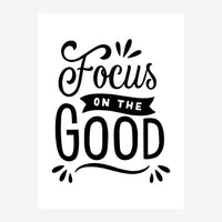 Affiche typographique noire sur fond blanc avec le texte « Focus on the Good » en lettres calligraphiées, orné de petits.