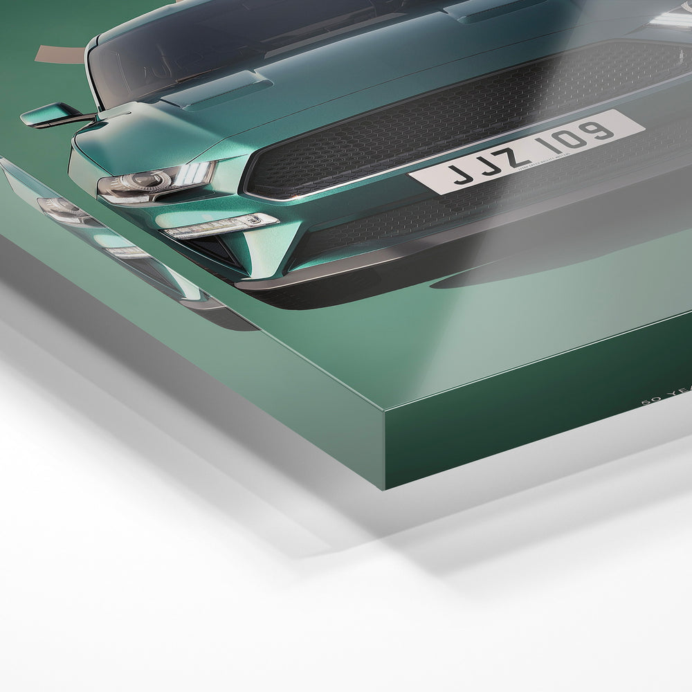 Gros plan de la matière : le tirage sous verre acrylique, tranche transparente visible.