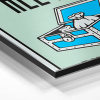 Gros plan de la matière : le tirage contrecollé sur aluminium Dibond mat, tranche visible.