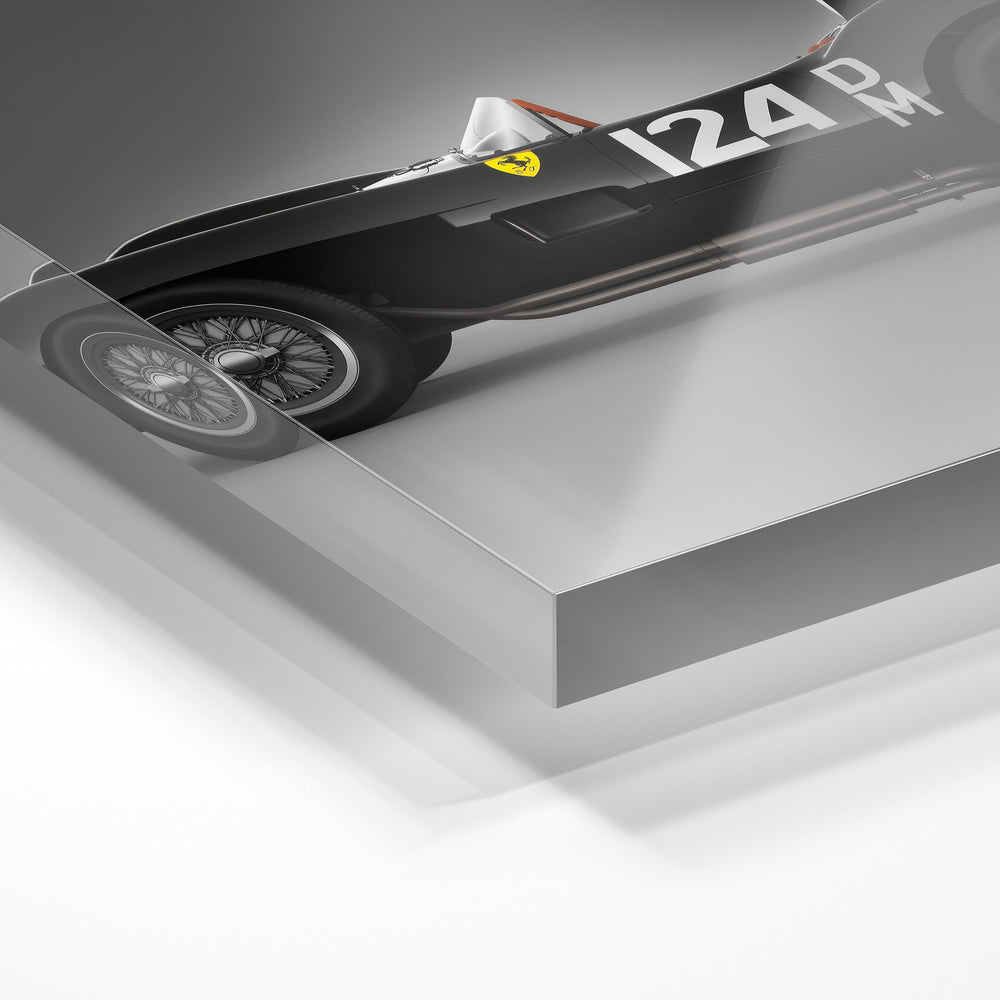 Gros plan de la matière : le tirage sous verre acrylique, tranche transparente visible.