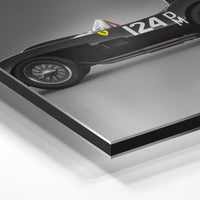 Gros plan de la matière : le tirage contrecollé sur aluminium Dibond mat, tranche visible.