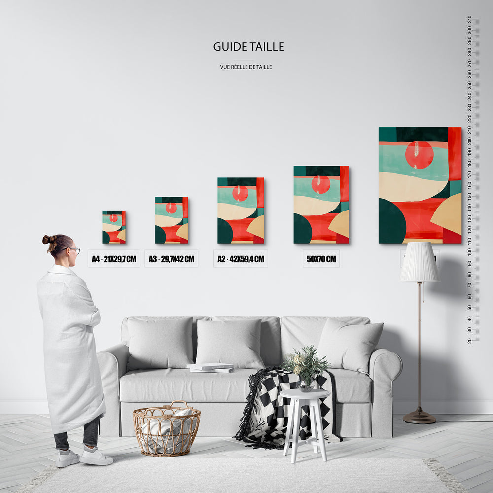 Guide des tailles : le tirage présenté dans ses 5 formats de vente, à l'échelle réelle sur un mur de salon, avec une règle en centimètres.
