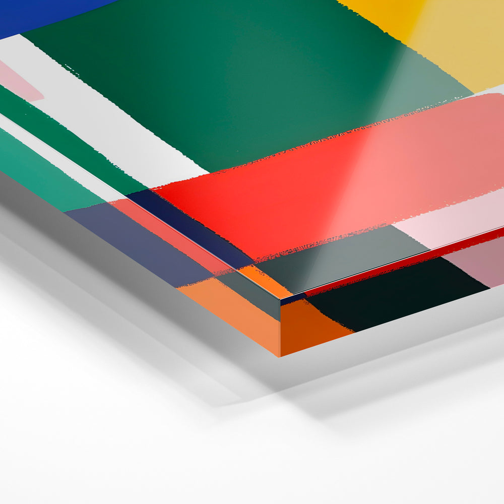 Gros plan de la matière : le tirage sous verre acrylique, tranche transparente visible.