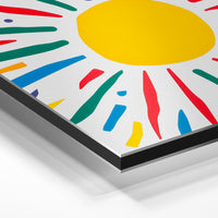Gros plan de la matière : le tirage contrecollé sur aluminium Dibond mat, tranche visible.