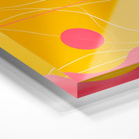 Gros plan de la matière : le tirage sous verre acrylique, tranche transparente visible.