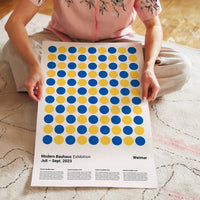 L'impression présentée en poster, sans encadrement, sur un mur neutre.