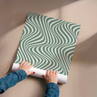 L'impression présentée en poster, sans encadrement, sur un mur neutre.