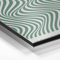 Gros plan de la matière : le tirage contrecollé sur aluminium Dibond mat, tranche visible.