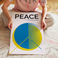 L'impression présentée en poster, sans encadrement, sur un mur neutre.