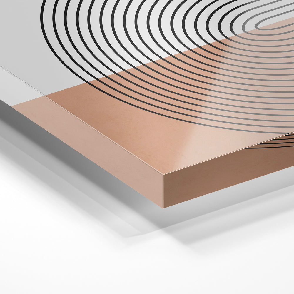 Gros plan de la matière : le tirage sous verre acrylique, tranche transparente visible.