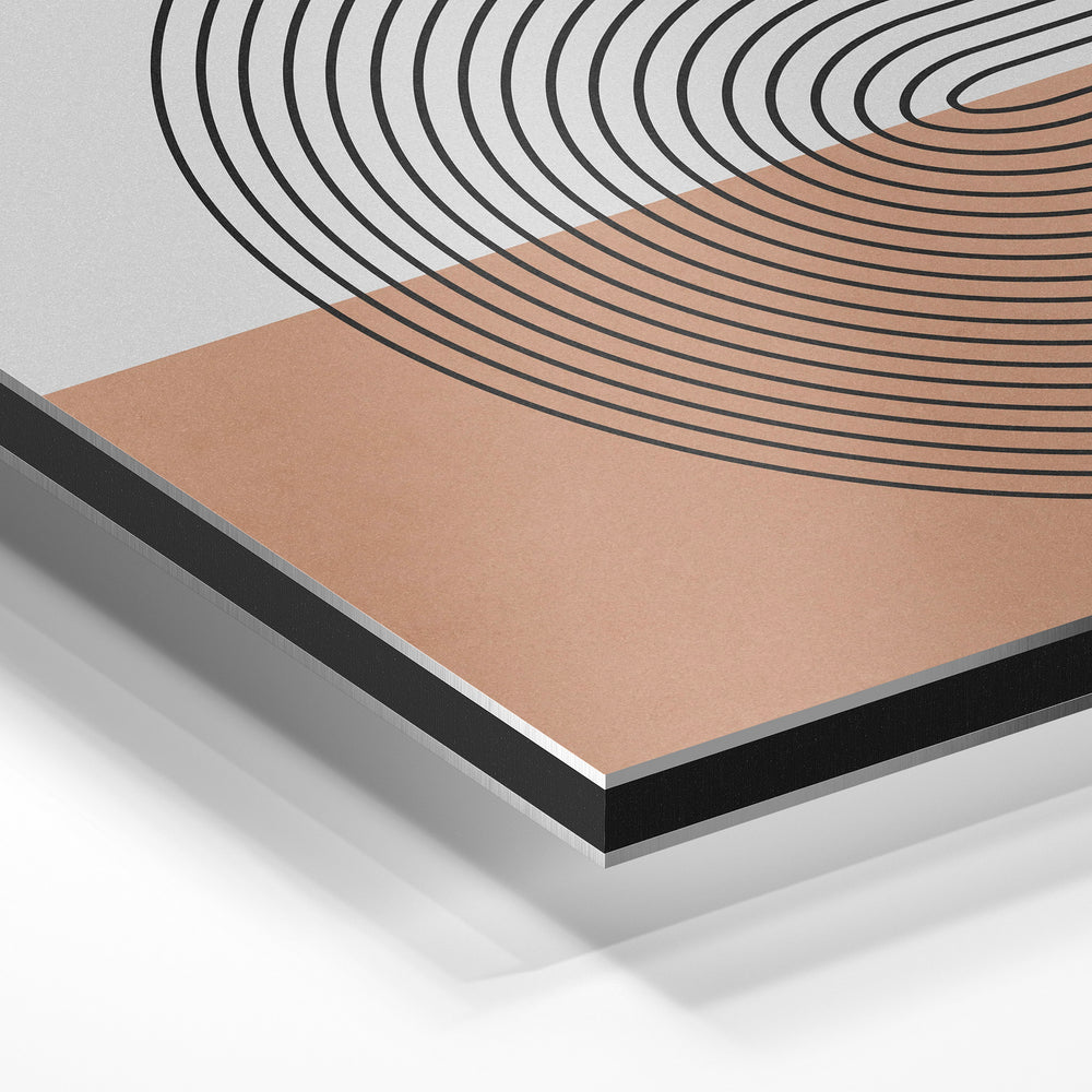 Gros plan de la matière : le tirage contrecollé sur aluminium Dibond mat, tranche visible.