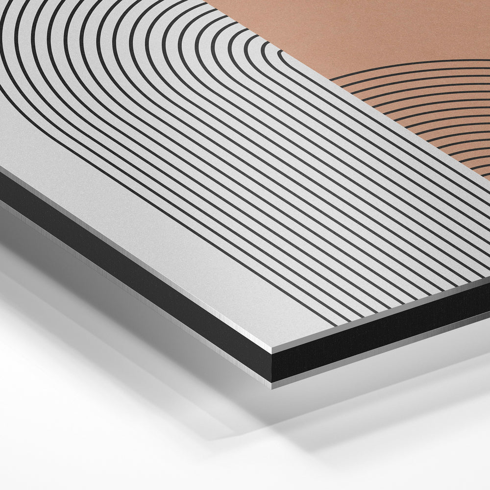 Gros plan de la matière : le tirage contrecollé sur aluminium Dibond mat, tranche visible.