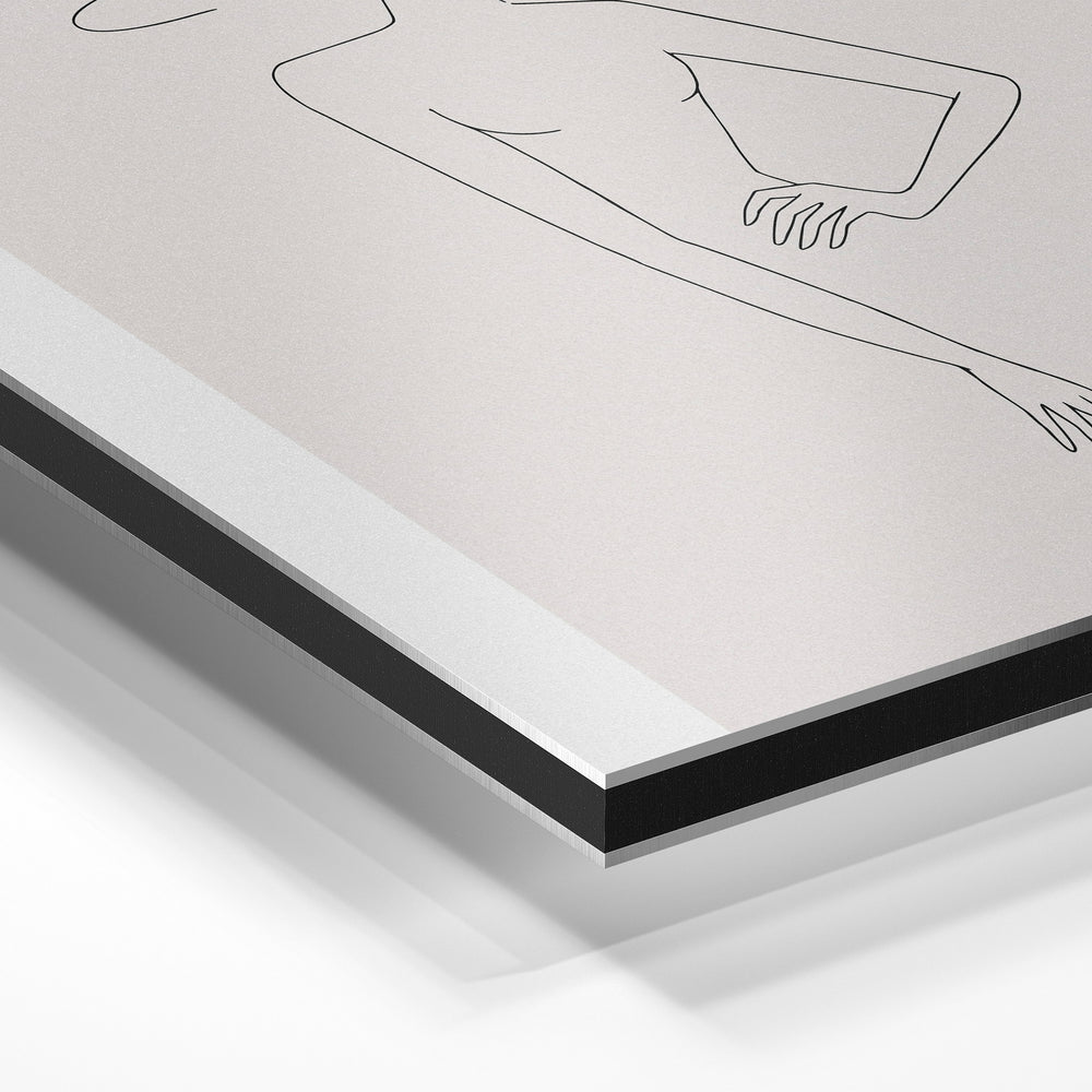 Gros plan de la matière : le tirage contrecollé sur aluminium Dibond mat, tranche visible.