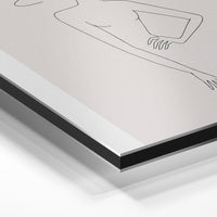 Gros plan de la matière : le tirage contrecollé sur aluminium Dibond mat, tranche visible.