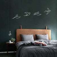 Décorations métals oiseaux blancs