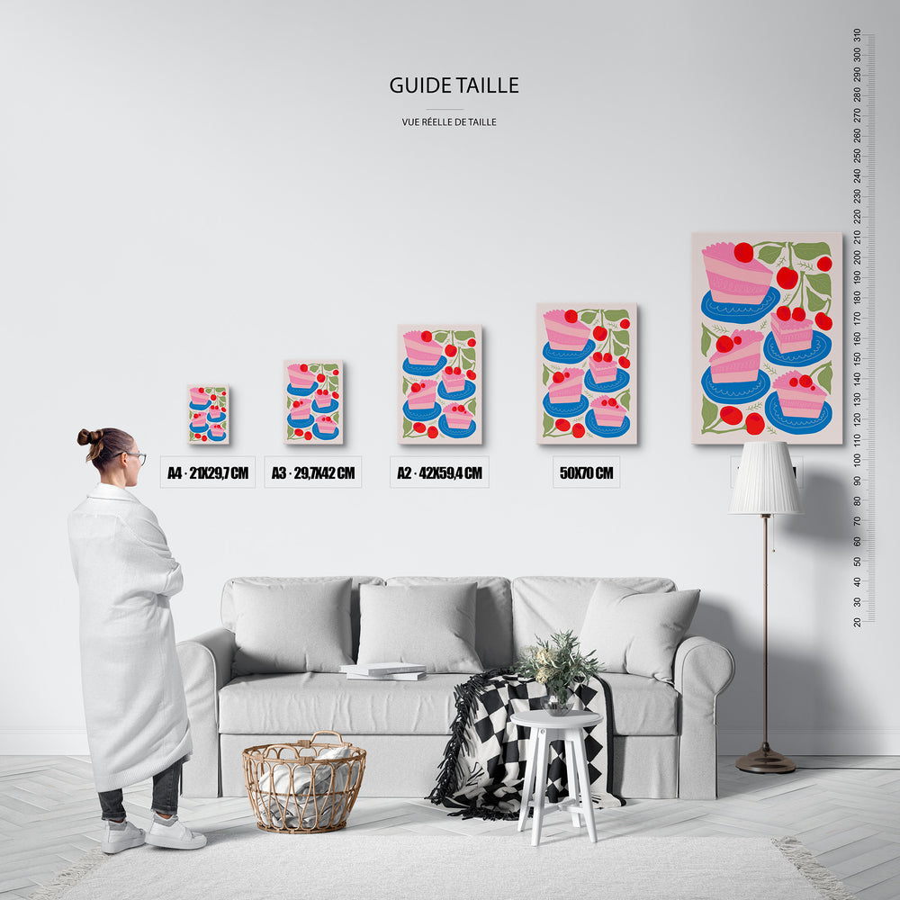 Guide des tailles : le tirage présenté dans ses 5 formats de vente, à l'échelle réelle sur un mur de salon, avec une règle en centimètres.