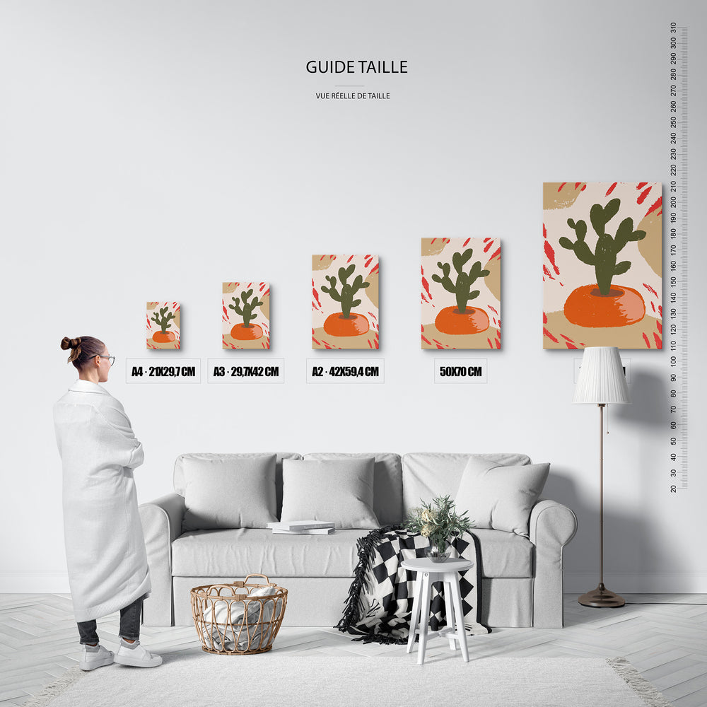Guide des tailles : le tirage présenté dans ses 5 formats de vente, à l'échelle réelle sur un mur de salon, avec une règle en centimètres.