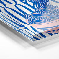 Gros plan de la matière : le tirage sous verre acrylique, tranche transparente visible.