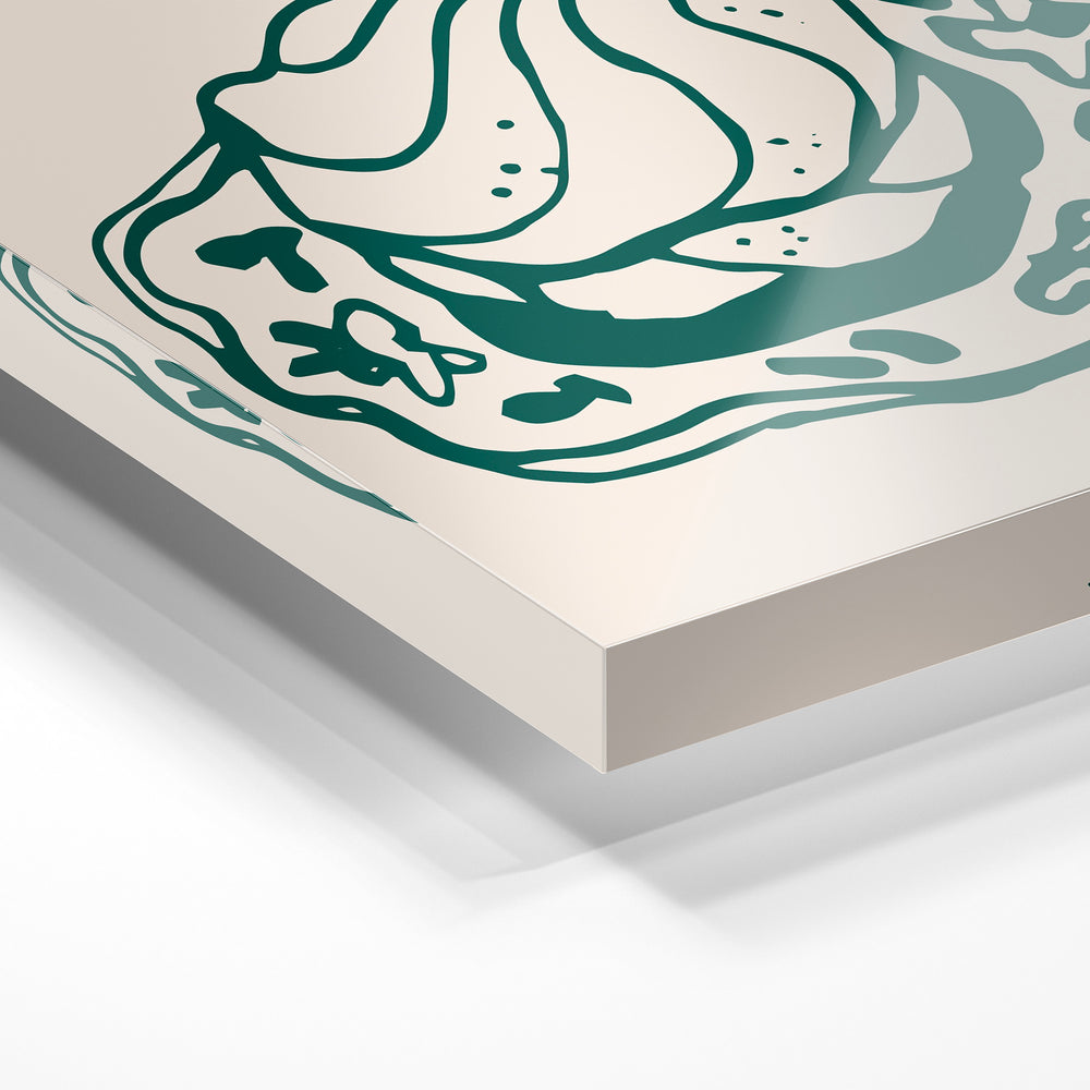 Gros plan de la matière : le tirage sous verre acrylique, tranche transparente visible.