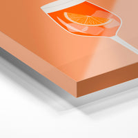 Gros plan de la matière : le tirage sous verre acrylique, tranche transparente visible.
