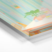 Gros plan de la matière : le tirage sous verre acrylique, tranche transparente visible.