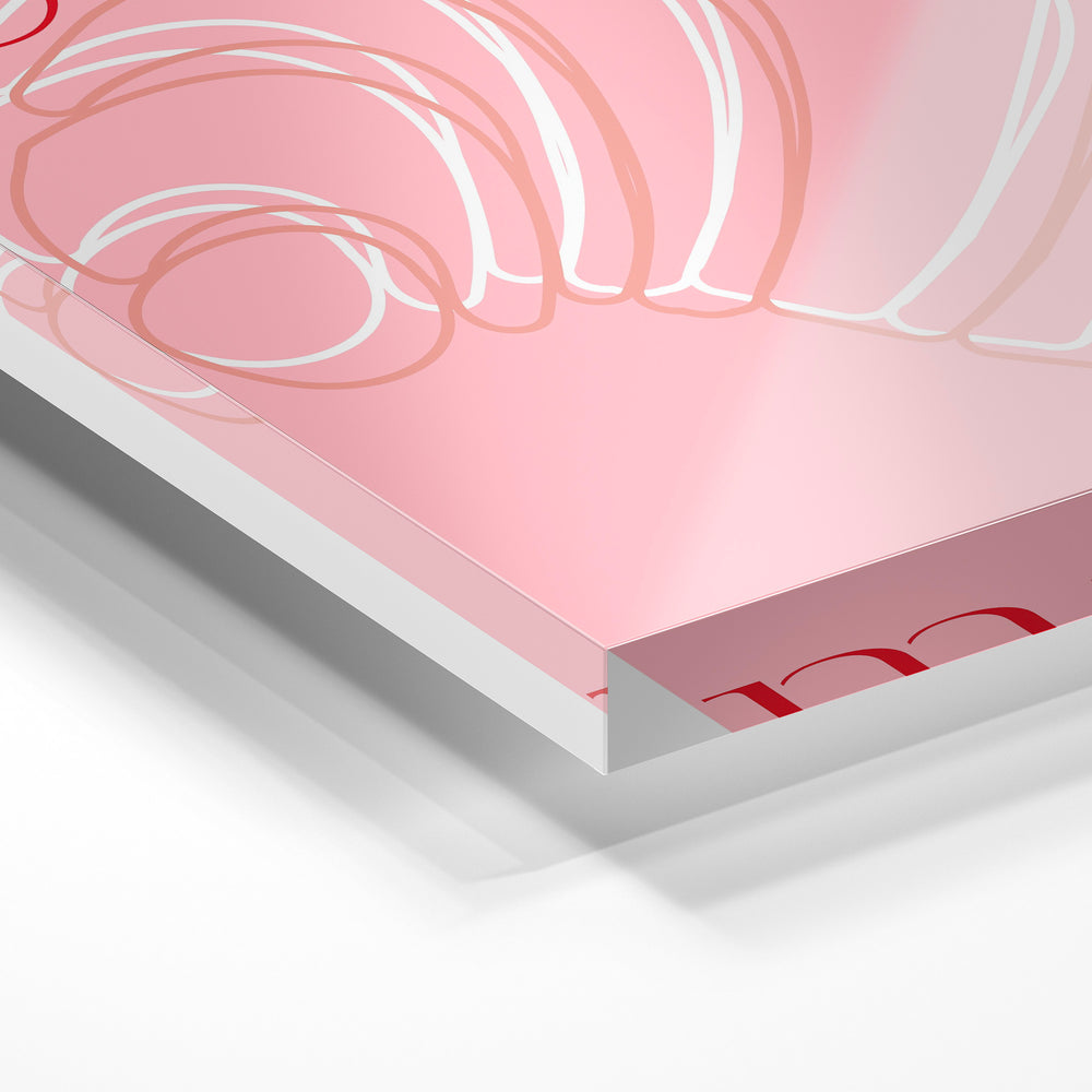Gros plan de la matière : le tirage sous verre acrylique, tranche transparente visible.