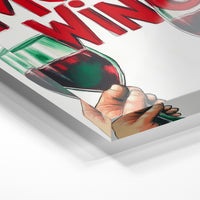 Gros plan de la matière : le tirage sous verre acrylique, tranche transparente visible.