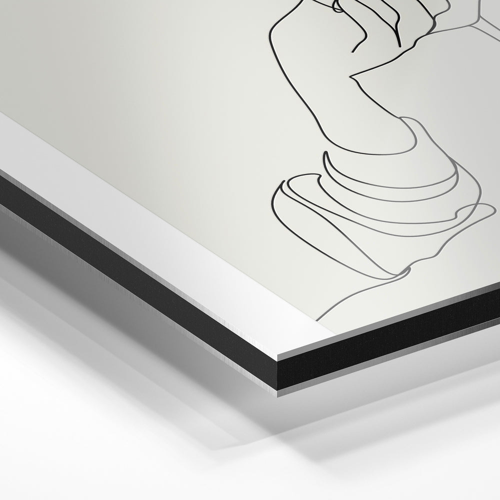 Gros plan du relief : la surépaisseur d'encre en lumière rasante sur aluminium Dibond.