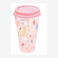 Illustration d'un gobelet de café rose pâle avec couvercle rose et motifs de feuilles dorées, pois colorés et formes.