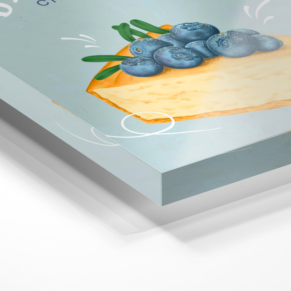 Gros plan de la matière : le tirage sous verre acrylique, tranche transparente visible.
