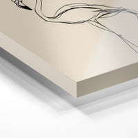 Gros plan de la matière : le tirage sous verre acrylique, tranche transparente visible.