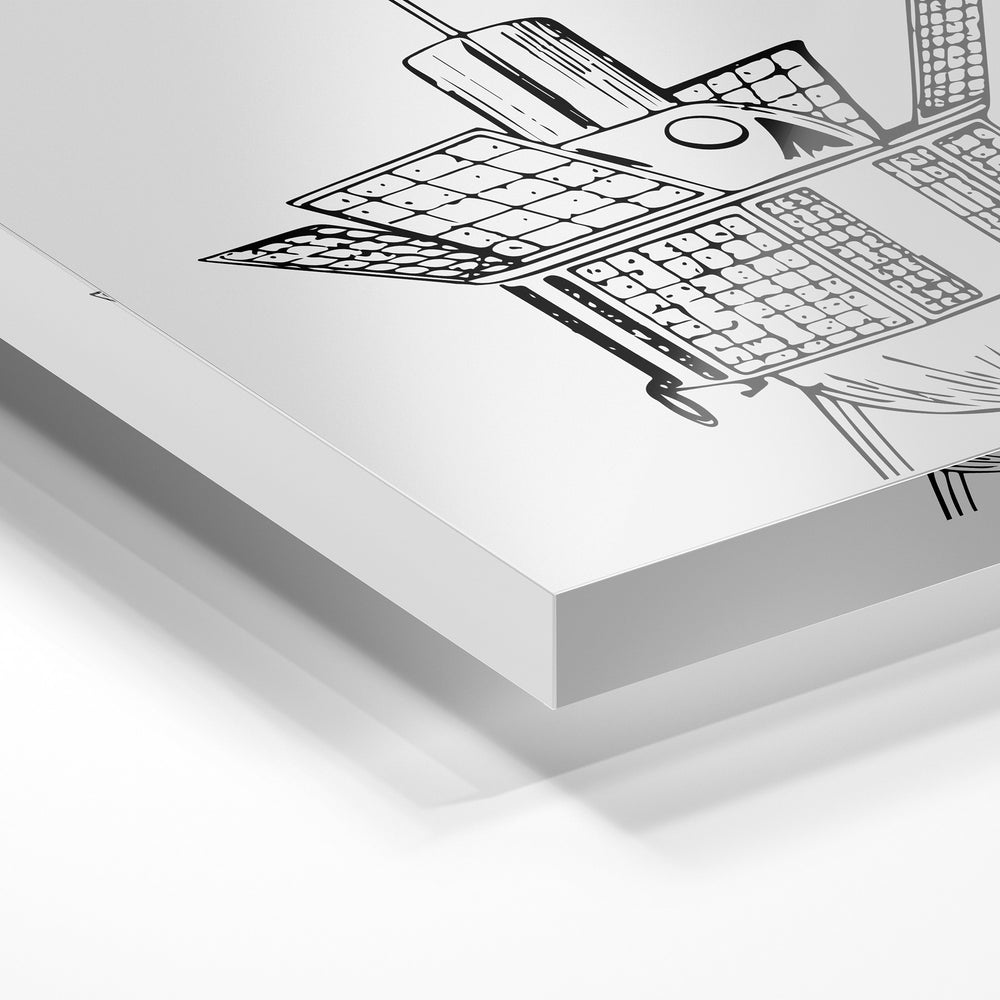 Gros plan de la matière : le tirage sous verre acrylique, tranche transparente visible.