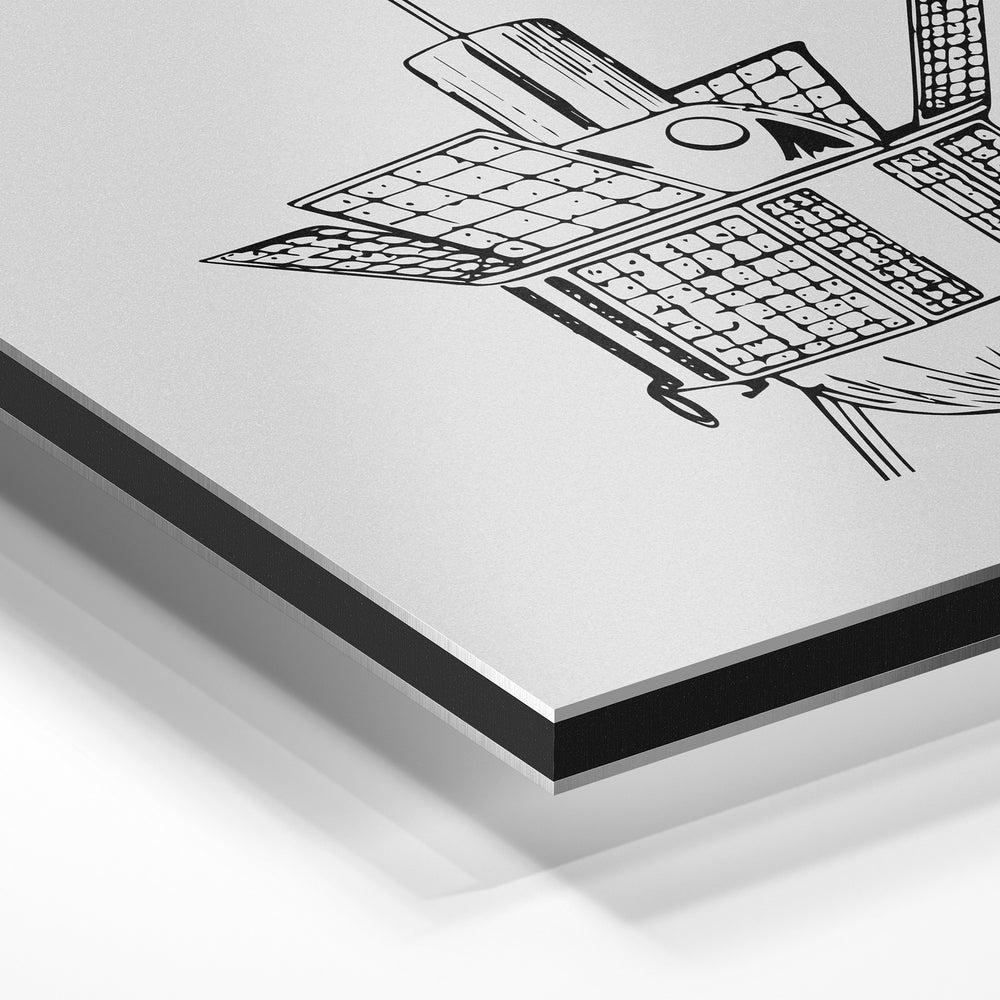 Gros plan de la matière : le tirage contrecollé sur aluminium Dibond mat, tranche visible.