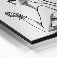 Gros plan de la matière : le tirage contrecollé sur aluminium Dibond mat, tranche visible.