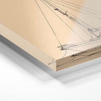 Gros plan de la matière : le tirage sous verre acrylique, tranche transparente visible.