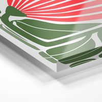 Gros plan de la matière : le tirage sous verre acrylique, tranche transparente visible.