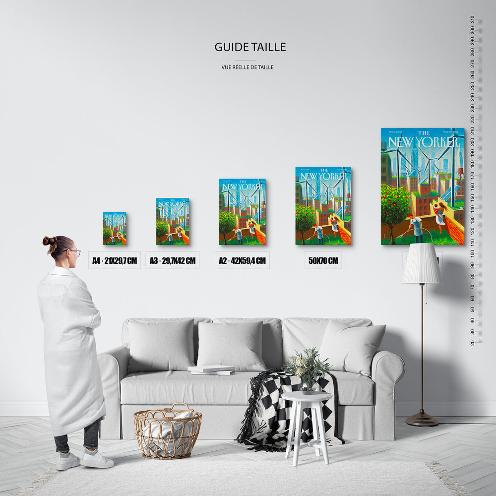 Guide des tailles : le tirage présenté dans ses 5 formats de vente, à l'échelle réelle sur un mur de salon, avec une règle en centimètres.