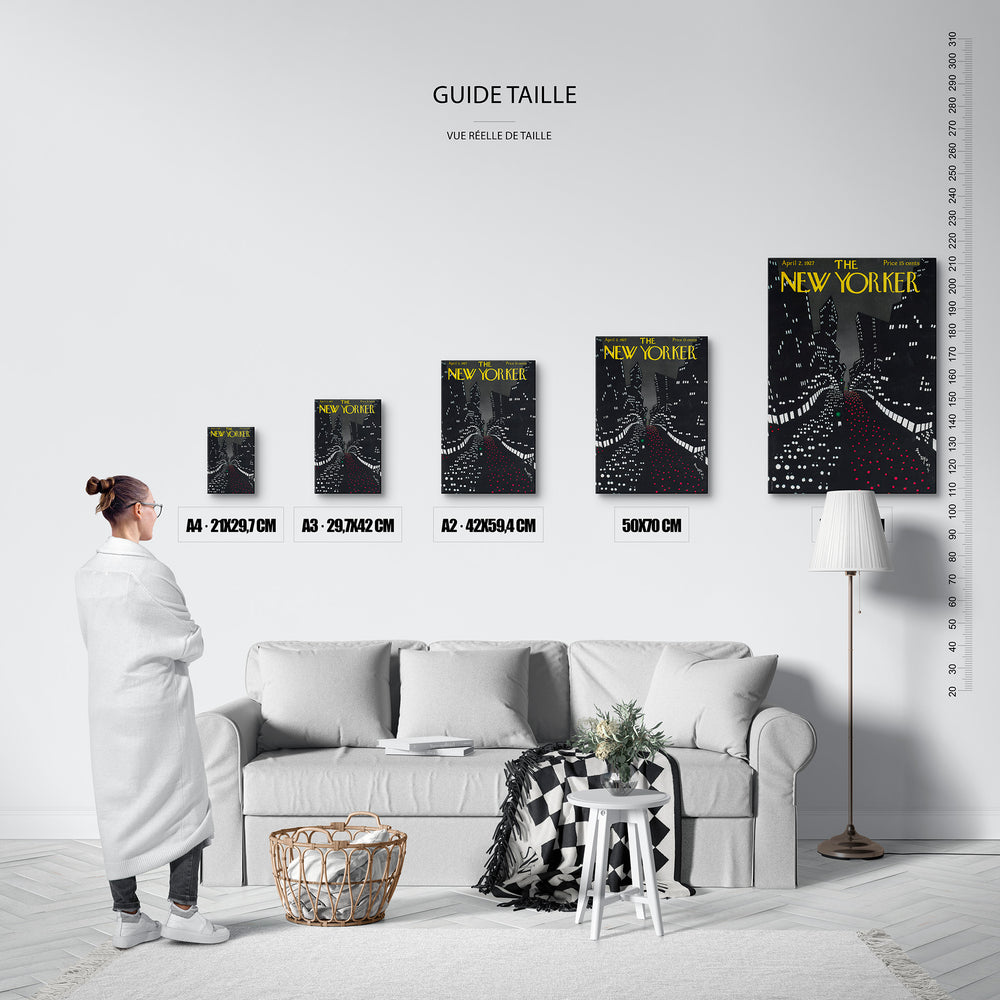 Guide des tailles : le tirage présenté dans ses 5 formats de vente, à l'échelle réelle sur un mur de salon, avec une règle en centimètres.