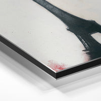 Gros plan de la matière : le tirage contrecollé sur aluminium Dibond mat, tranche visible.