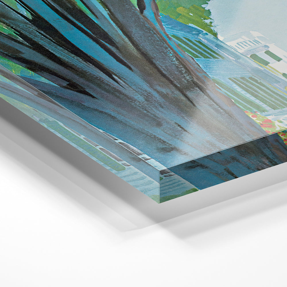 Gros plan de la matière : le tirage sous verre acrylique, tranche transparente visible.