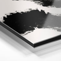 Gros plan du relief : la surépaisseur d'encre en lumière rasante sur aluminium Dibond.