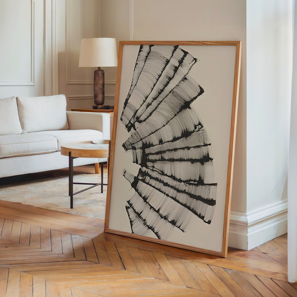 Le tableau accroché en situation dans un intérieur meublé.