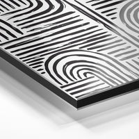 Gros plan du relief : la surépaisseur d'encre en lumière rasante sur aluminium Dibond.