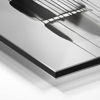 Gros plan du relief : la surépaisseur d'encre en lumière rasante sur aluminium Dibond.