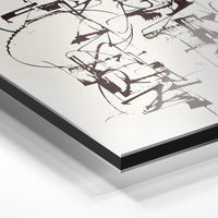 Gros plan du relief : la surépaisseur d'encre en lumière rasante sur aluminium Dibond.