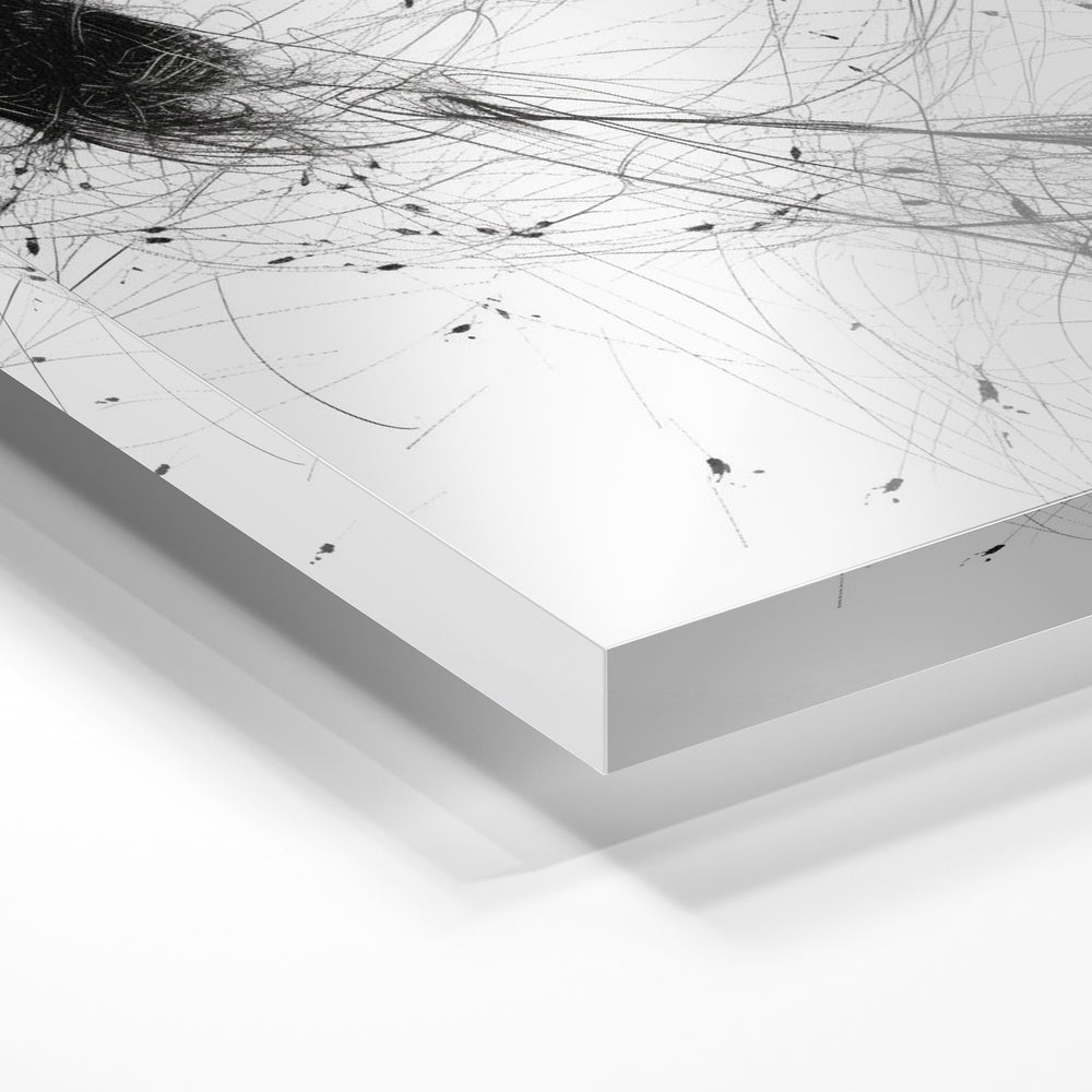 Gros plan de la matière : le tirage sous verre acrylique, tranche transparente visible.